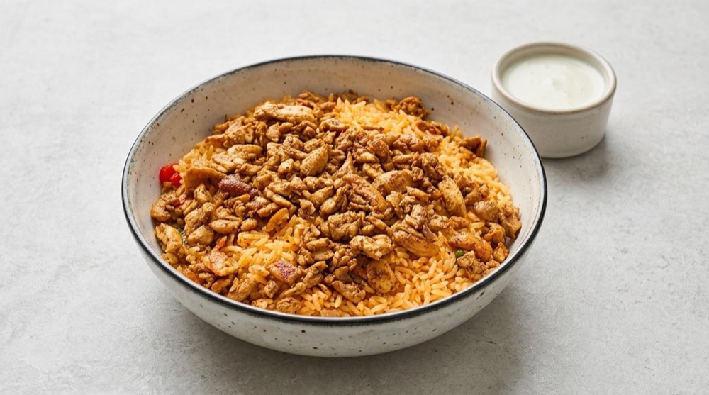 La Morenita’s grilled meat and rice with cheese dip