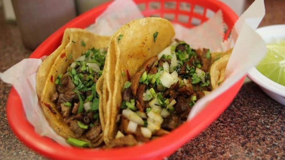 La Morenita’s street tacos with onion, cilantro, and lime